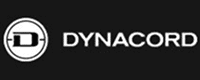 Dynacord: Logo de marque et équipement audio Logo Dynacord. Symbole rond avec un « D » stylisé blanc sur fond noir. À droite, le nom de la marque « DYNACORD » en lettres capitales blanches.